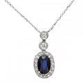 Oval Natural Blue Sapphire and Diamond Halo Necklace with Chain in 9ct White Gold