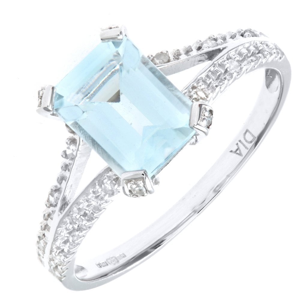 9ct White Gold Emerald Cut Aquamarine Ring With 0.07ct Diamond Shoulders