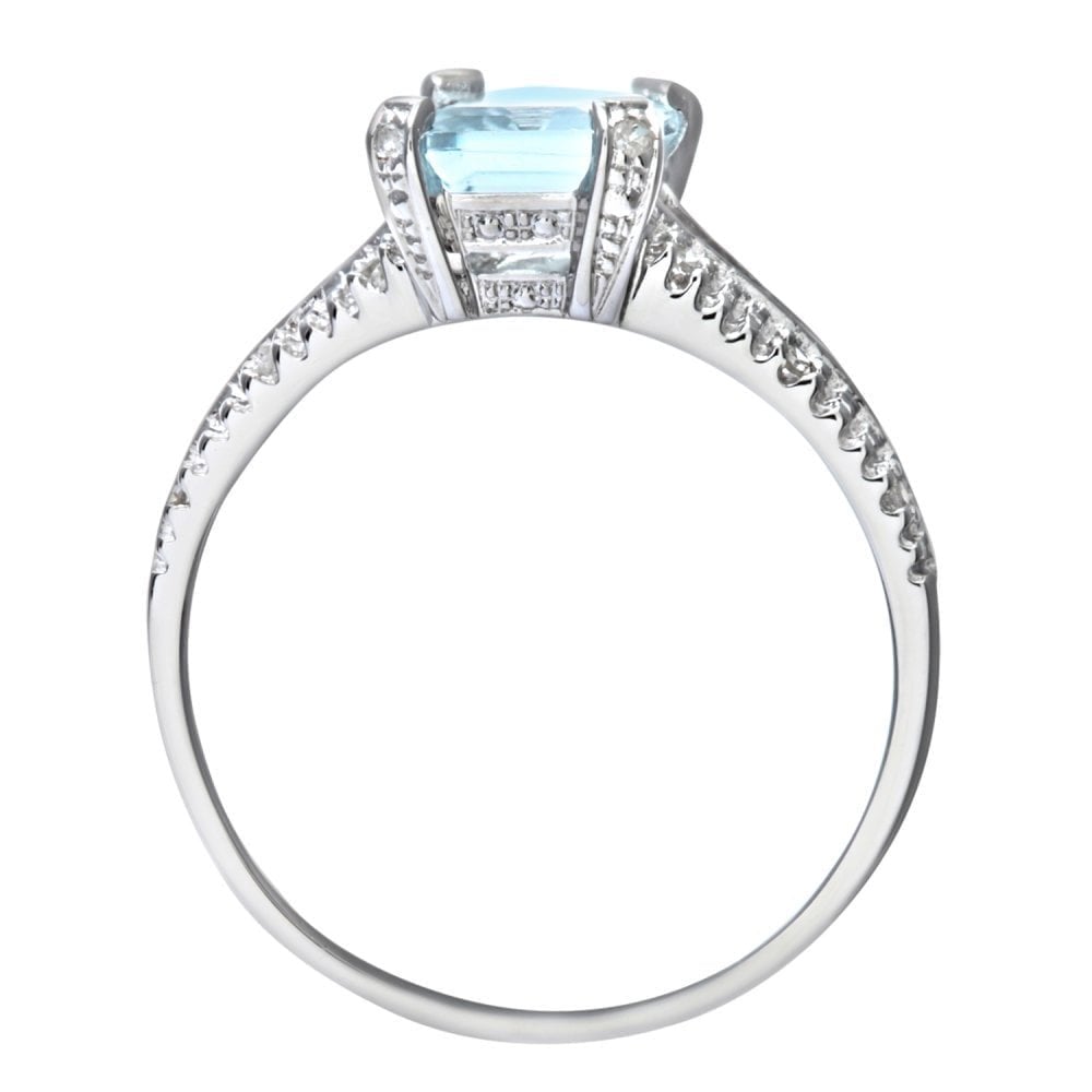 9ct White Gold Emerald Cut Aquamarine Ring With 0.07ct Diamond Shoulders