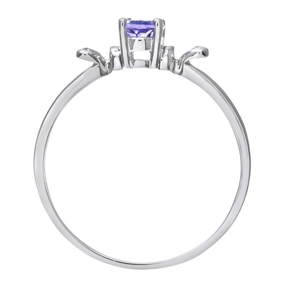 9ct White Gold Tanzanite Ring With 0.01ct Diamond Set Heart Shoulders