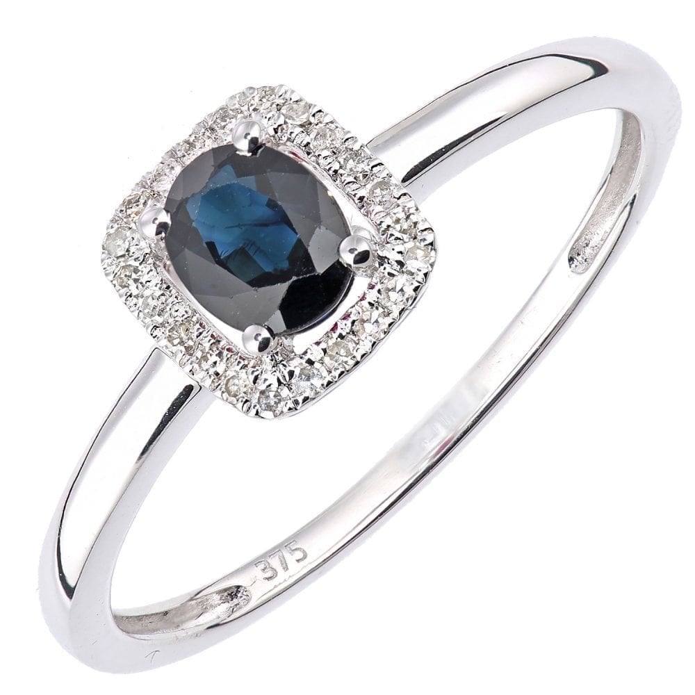 0.58 Ct Oval Natural Blue Sapphire and Diamond Solitaire Halo Ring in 9ct White Gold