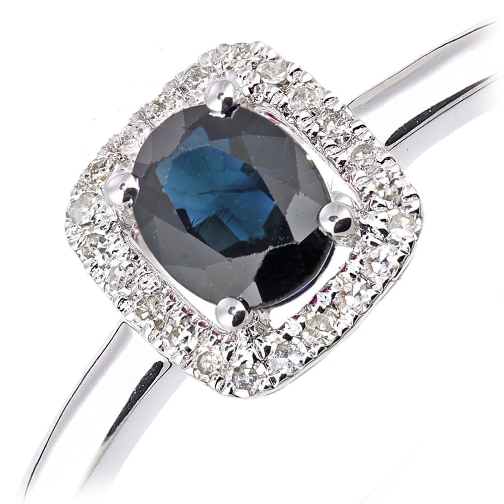 0.58 Ct Oval Natural Blue Sapphire and Diamond Solitaire Halo Ring in 9ct White Gold