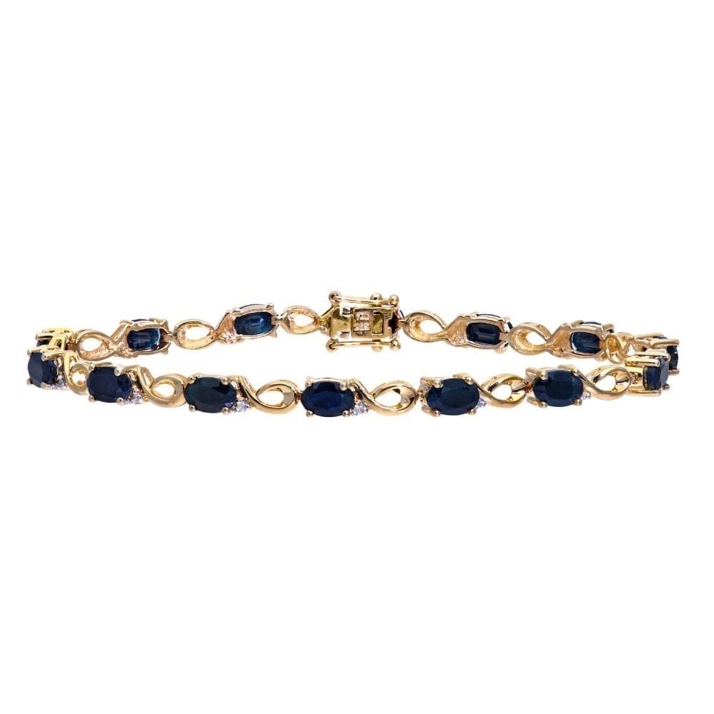 Oval Natural Black Sapphire and Diamond Bracelet in 9ct Yellow Gold