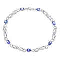 9ct White Gold Oval Tanzanite and 0.10ct Diamond Bracelet