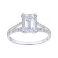 9ct White Gold Emerald Cut Aquamarine Ring With 0.07ct Diamond Shoulders