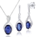 9ct White Gold Oval Sapphire and 0.05ct Diamond Crossover Pendant Necklace and Earrings Set