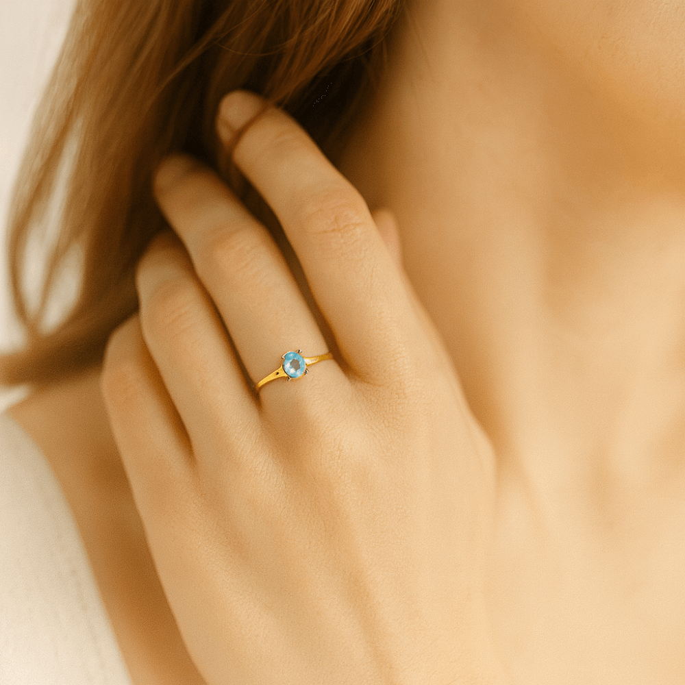 9ct Yellow Gold Sky Blue Topaz Solitaire Ring