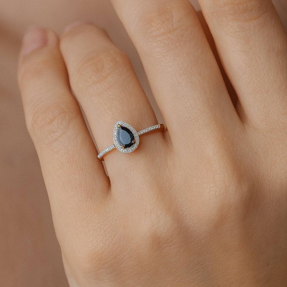 0.6 Ct Pear Natural Blue Sapphire and Diamond Solitaire Halo Ring in 18ct Yellow Gold