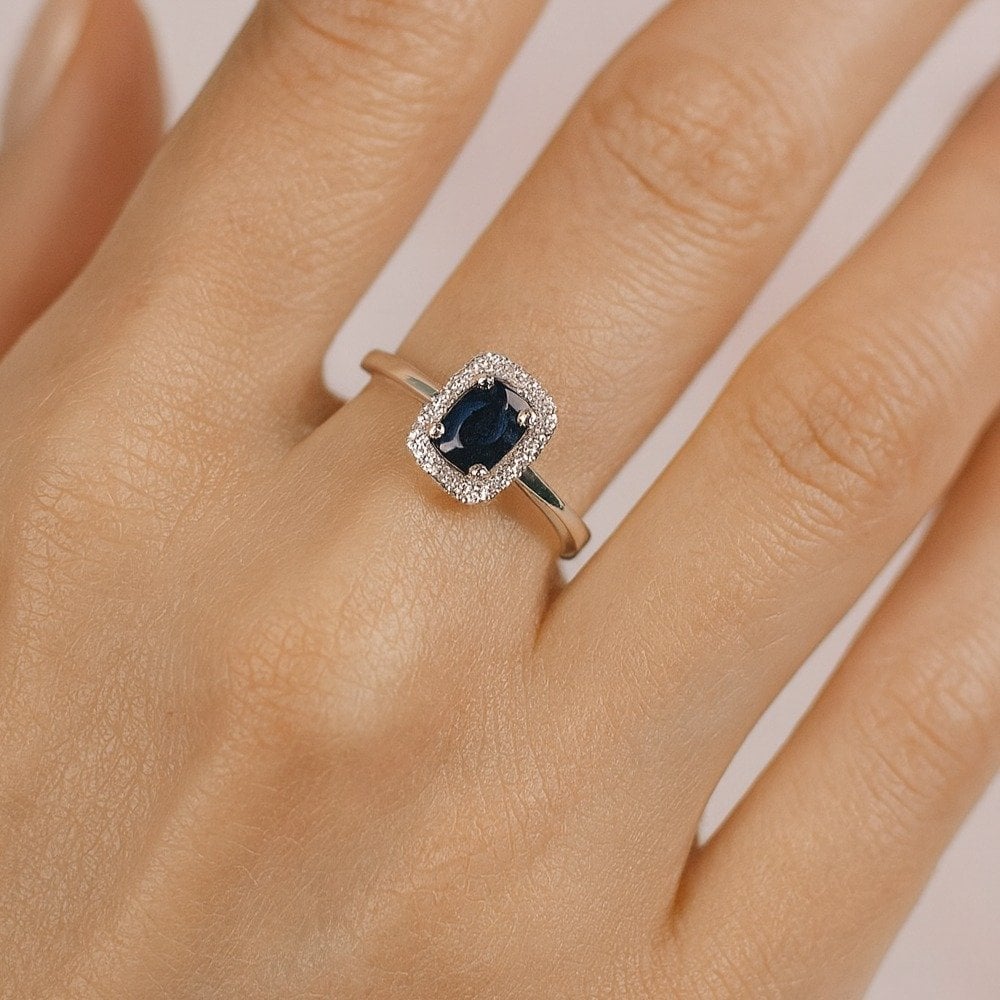 0.58 Ct Oval Natural Blue Sapphire and Diamond Solitaire Halo Ring in 9ct White Gold