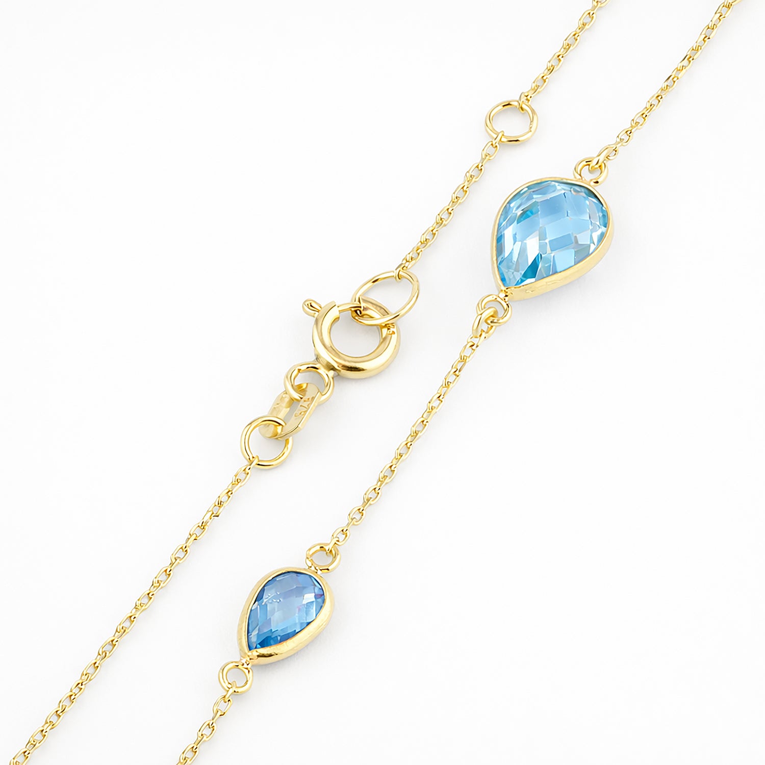 9ct Yellow Gold Blue Pear Cut Cubic Zirconia Trilogy Station Bracelet