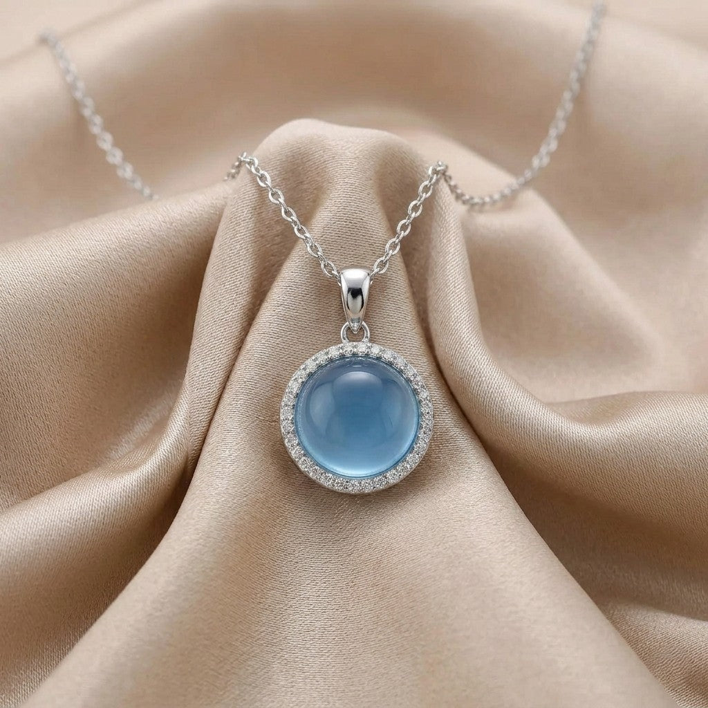 London Blue Topaz Halo Necklace in 9ct White Gold