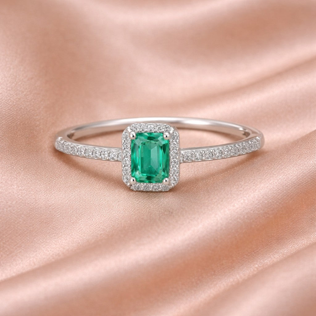 18ct White Gold 0.60ct Octagon Emerald and Diamond Halo Ring