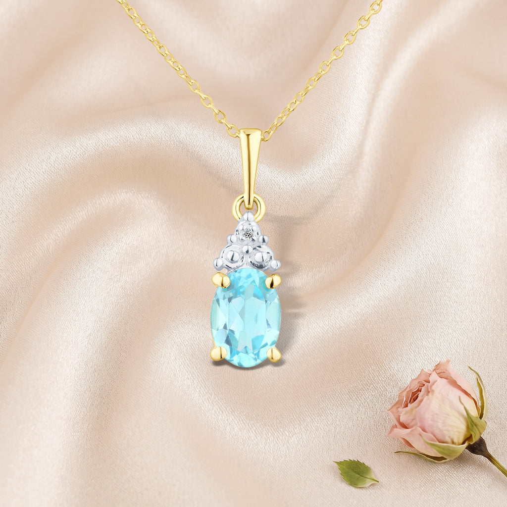 9ct Yellow Gold Blue Topaz and Diamond Pendant