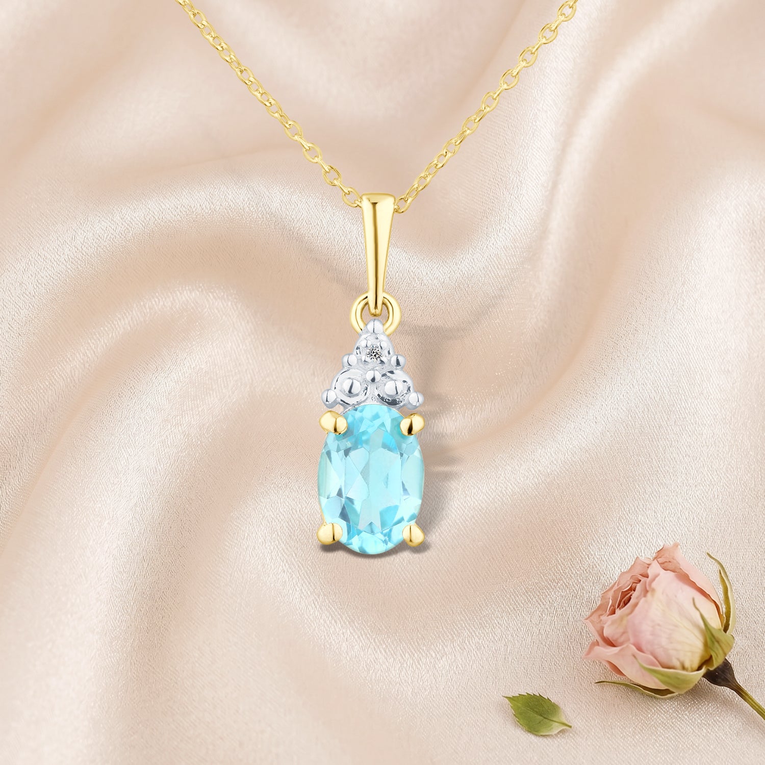 9ct Yellow Gold Blue Topaz and Diamond Pendant