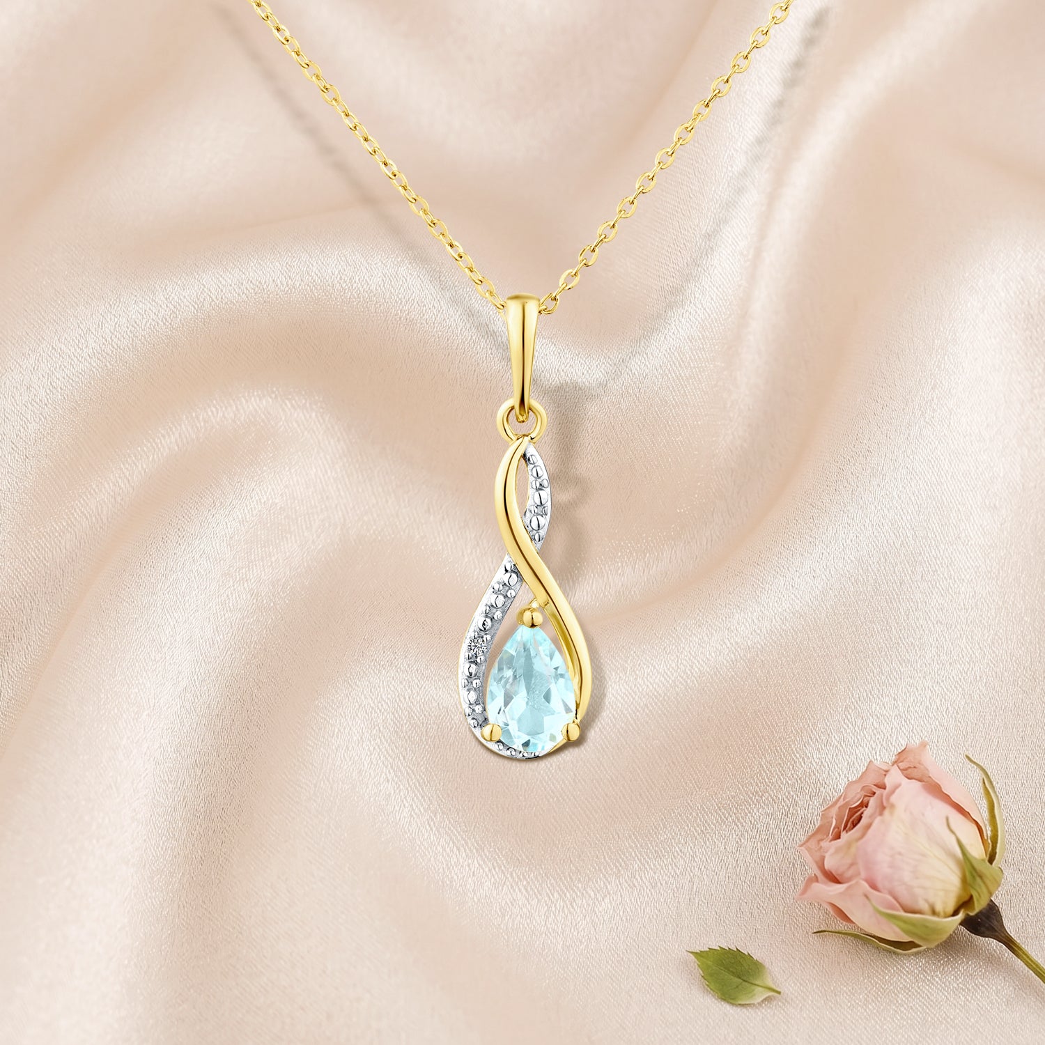 9ct Yellow Gold Blue Topaz and Diamond Infinity Pendant