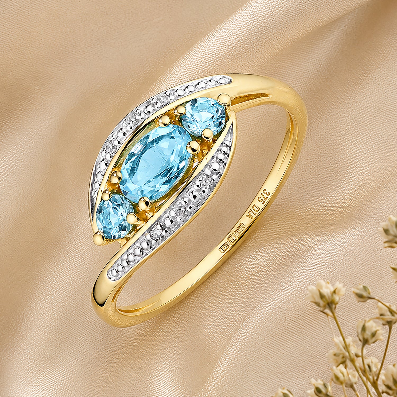 9ct Yellow Gold Blue Topaz and Diamond Trilogy Crossover Ring
