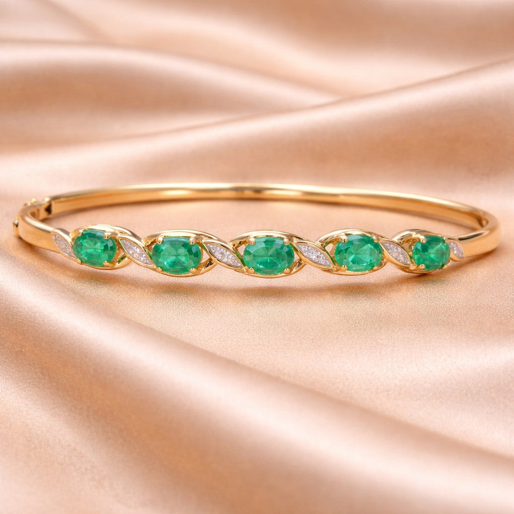 9ct Yellow Gold Oval Emerald and 0.05ct Diamond Bangle