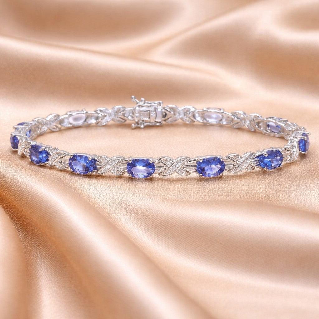 9ct White Gold Oval Tanzanite and 0.05ct Diamond Bracelet