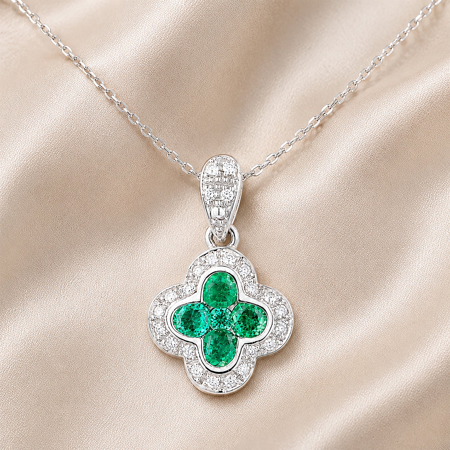9ct White Gold Emerald and Diamond Quatrefoil Halo Pendant Necklace