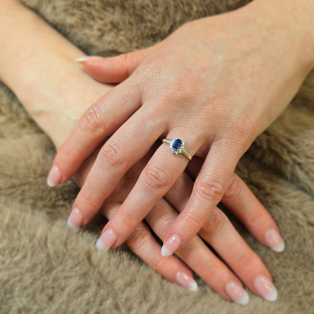 0.62 Ct Oval Natural Blue Sapphire and Diamond Victrian Halo Ring in 9ct Yellow Gold