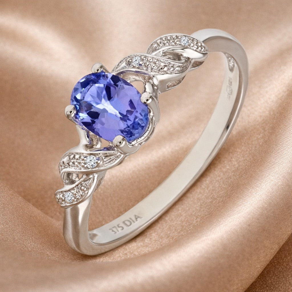9ct White Gold Oval Tanzanite Ring with Pave Set 0.02ct Diamond Twist Shoulders