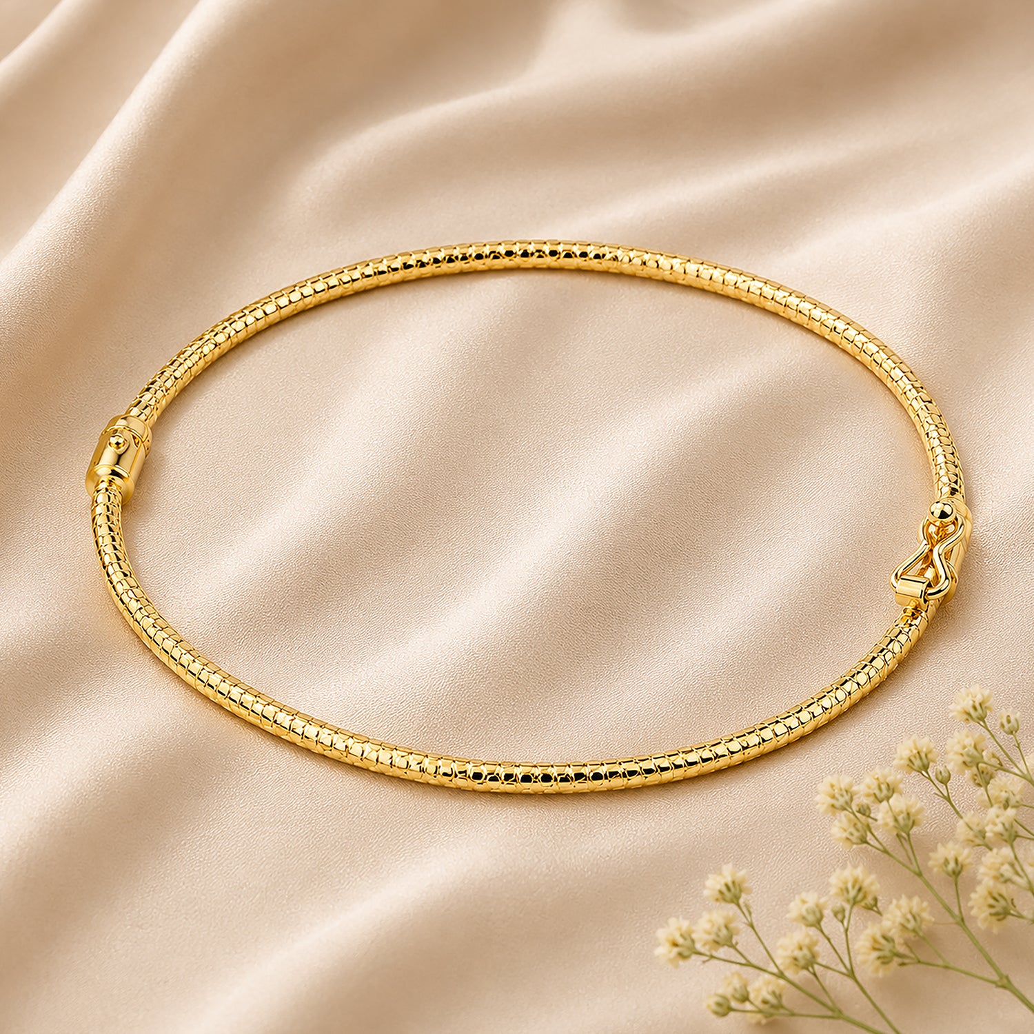 9ct Yellow Gold 6x5cm Diamond Cut Bangle