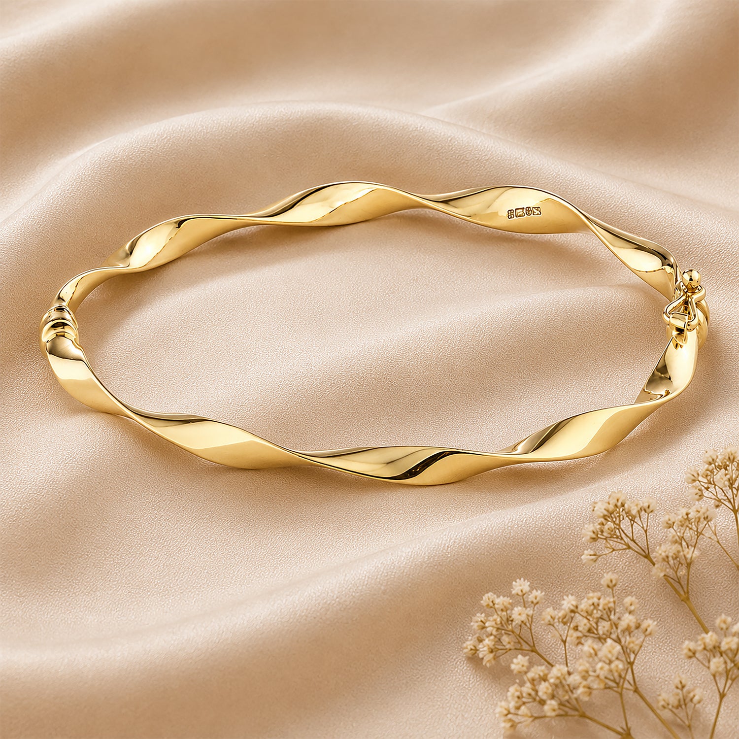 9ct Yellow Gold 6x5cm Twist Bangle