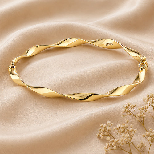 9ct Yellow Gold 6x5cm Twist Bangle